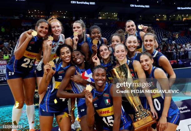 Italy's players celebrate with the trophy after winning the CEV EuroVolley 2021 women's volleyball final match between Serbia and Italy, in Belgrade...