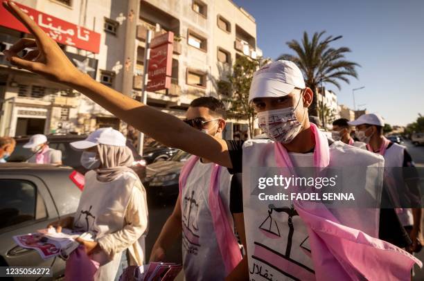 Supporters of the the Istiqlal Party cheer their candidate as they gather during a campaign rally in Rabat, on September 4 four days ahead of the...