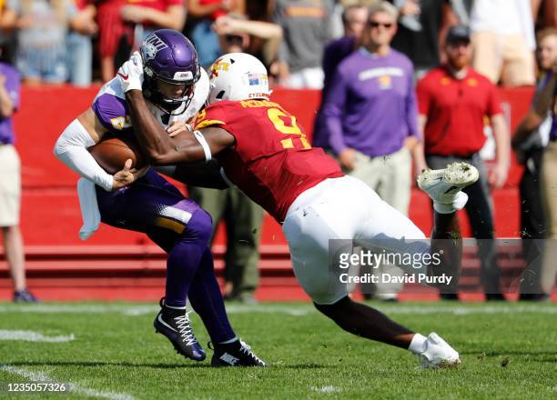 Defensive end Will McDonald IV of the Iowa State Cyclones sacks quarterback Will McElvain of the Northern Iowa Panthers as he scrambles for yards in...