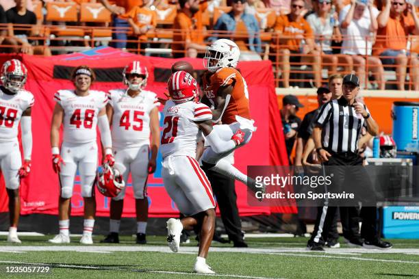 University of Texas Long Horns wide receiver Casey Cain makes a catch during the game against cornerback Trey Amos of the Louisiana - Lafayette Ragin...