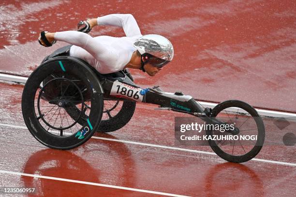 Switzerland's Marcel Hug competes in the men's marathon T54 event during the Tokyo 2020 Paralympic Games at the Olympic Stadium in Tokyo on September...