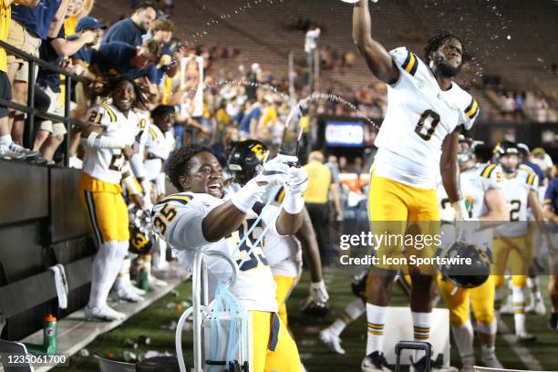 East Tennessee State Buccaneers players Chandler Martin and Olajuwon Pinkelton celebrate in final moments of a game between the Vanderbilt Commodores...