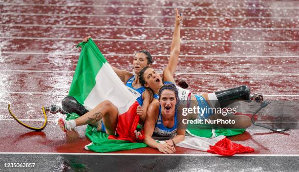 Silver medalist Martina Caironi of Team Italy, right, gold medalist Ambra Sabatini of Team Italy, second right, and bronze medalist Monica Graziana...