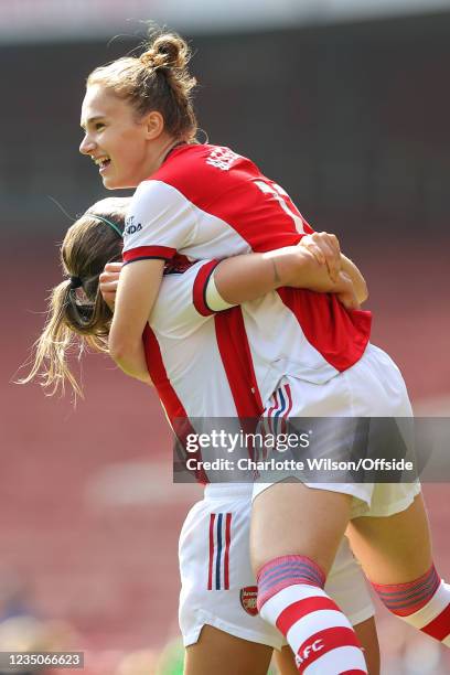 Vivianne Miedema of Arsenal celebrates scoring the opening goal with Katie McCabe during the Barclays FA Women's Super League match between Arsenal...