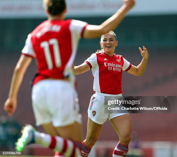 Katie McCabe of Arsenal celebrates with goalscorer Vivianne Miedema after providing the assist during the Barclays FA Women's Super League match...