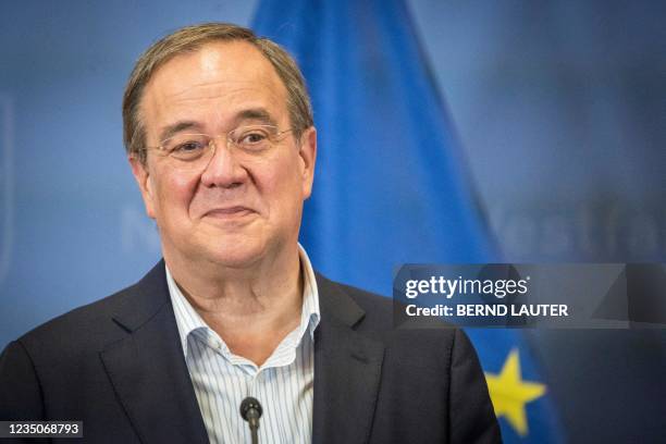 North Rhine-Westphalia's State Premier and Germany's conservative Christian Democratic Union's chancellor candidate Armin Laschet smiles as he...