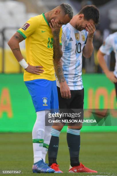 Brazil's Neymar and Argentina's Lionel Messi talk before their South American qualification football match for the FIFA World Cup Qatar 2022 at the...