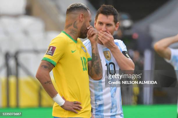 Brazil's Neymar and Argentina's Lionel Messi talk before their South American qualification football match for the FIFA World Cup Qatar 2022 at the...