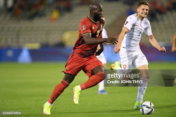 Belgium's forward Romelu Lukaku scores during the FIFA World Cup Qatar 2022 qualifying round Group E football match between Belgium and Czech...