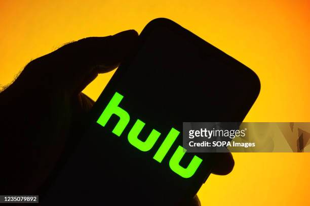 In this photo illustration the Hulu logo seen displayed on a smartphone.