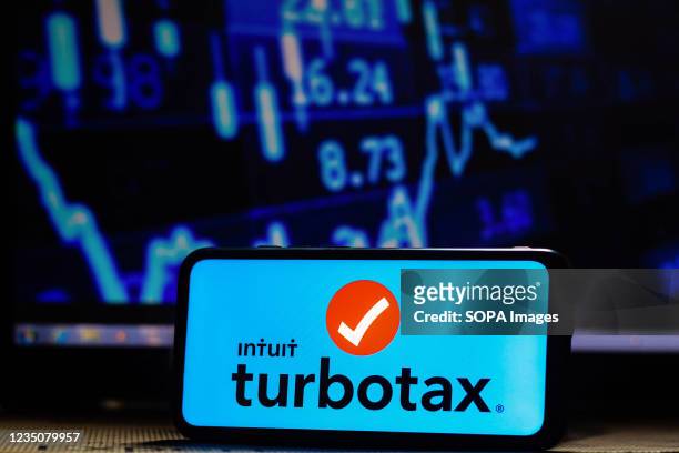 In this photo illustration the TurboTax logo seen displayed on a smartphone.