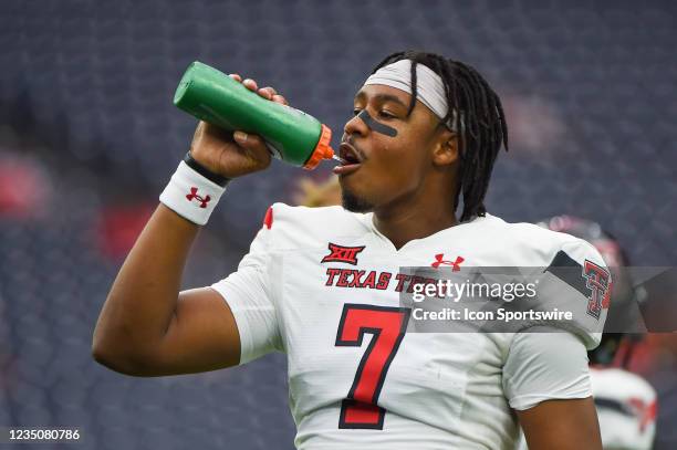 Texas Tech Red Raiders quarterback Donovan Smith takes a break during warmups before the football game between the Texas Tech Red Raiders and...