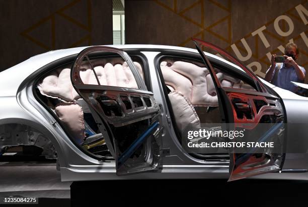 Airbag functionality is demonstrated in a Mercedes car during a press preview at the International Motor Show , on September 6, 2021 in Munich,...