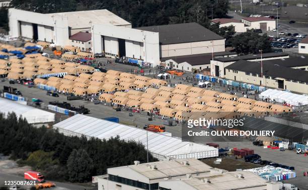 This picture taken on September 6, 2021 shows an aerial view of an Afghan refugee camp inside the US military base in Ramstein, Germany. - US...