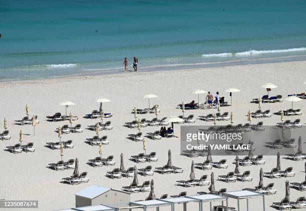 General view of tourists on the beach at the Melia Internacional Varadero Hotel in Varadero, Cuba, on September 3, 2021. - Cuba will gradually reopen...