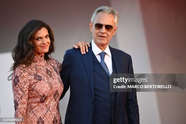 Italian tenor Andrea Bocelli and his wife Veronica Berti arrive for the screening of the film "La Caja" presented in competition on September 6, 2021...