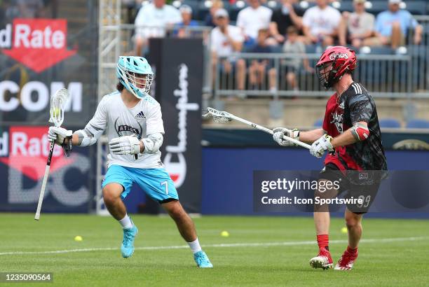 Atlas LC attack Jeff Heat defended by Chaos LC defense Jack Rowlett during the Premier Lacrosse League semi-final game between Atlas and Chaos on...