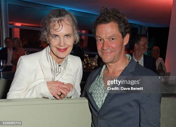 Elizabeth McGovern and Dominic West attend the ATG Summer Party hosted by Ambassador Theatre Group CEO Mark Cornell and Sienna Miller in support of...