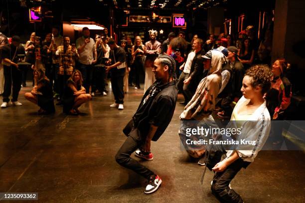 Larry Bourgeois and guests dance during the "Hennessy Very Special x Les Twins" launch event during the Mercedes-Benz Fashion Week Berlin September...