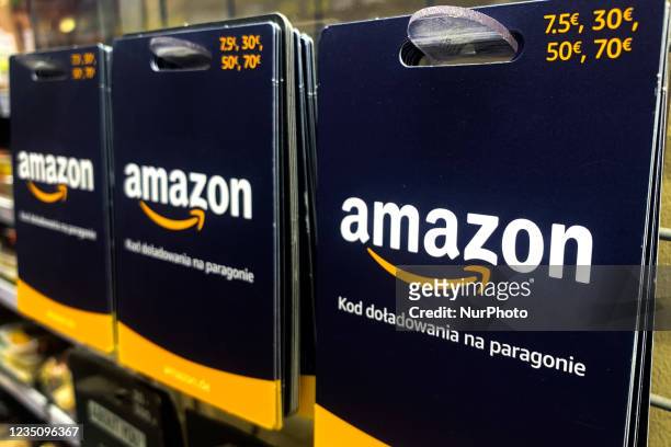 Amazon gift cards are seen in a shop in Krakow, Poland on August 21, 2021.