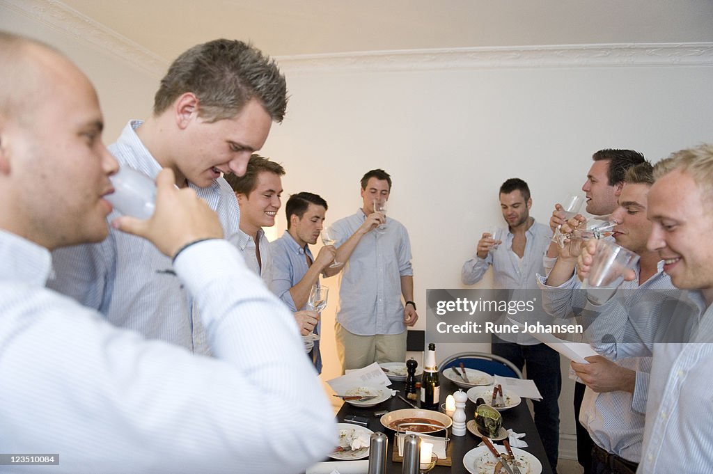 Members of Secret society drinking after making a toast, Denmark