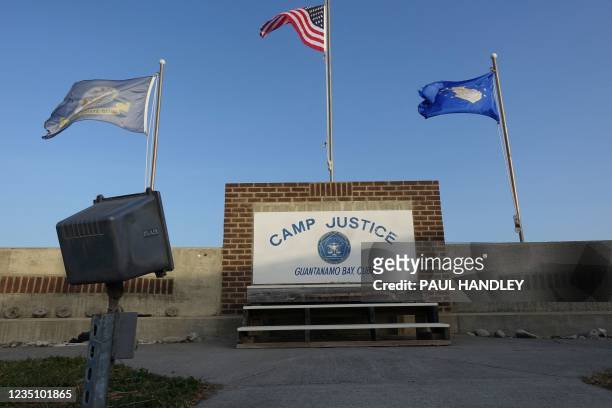 This photo screened by US Military officials on September 7, 2021 shows a sign for Camp Justice in Guantanamo Bay Naval Base, Cuba. - The trial of...