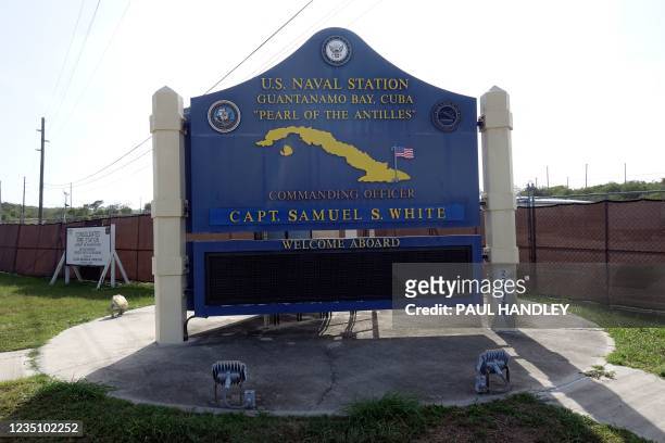 This photo screened by US Military officials on September 7, 2021 shows a sign for the US Naval Station in Guantanamo Bay, Cuba. - The trial of five...