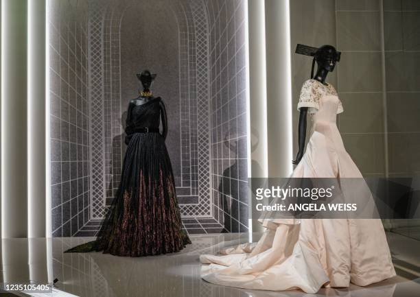 Creations by French fashion designer Christian Dior are on display at the Christian Dior: Designer of Dreams exhibition at the Brooklyn Museum in New...