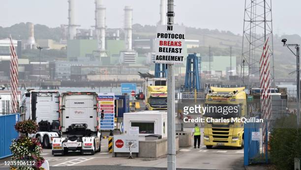 General views of Loyalist anti-Irish sea border posters as freight is checked at Larne harbour which is one of the main entry points between Northern...