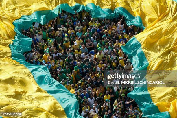 People take part in a demonstration in support of Brazilian President Jair Bolsonaro in Sao Paulo, on September 7 on Brazil's Independence Day. -...