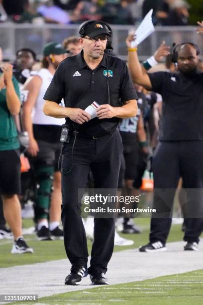 Ohio Bobcats Head Coach Tim Albin looks on from the sidelines during the first half of a college football game between the Syracuse Orange and the...