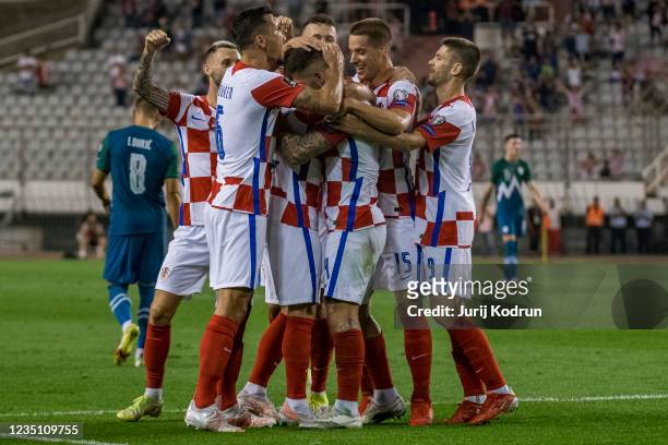 Marko Livaja of Croatia and teammates celebrate Croatia's opening goal during the 2022 FIFA World Cup Qualifier match between Croatia and Slovenia at...