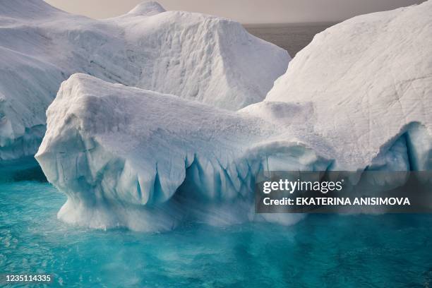 Icebergs are seen in the Arctic Ocean off the Franz Josef Land archipelago on August 20, 2021.