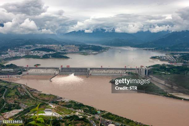 This aerial photo taken on September 7, 2020 shows water being released from the Three Gorges Dam, a hydropower project on the Yangtze river, in...