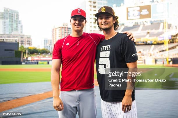 Yu Darvish of the San Diego Padres poses for a photo with Shohei Ohtani of the Los Angeles Angels before the game on September 7, 2021 at Petco Park...