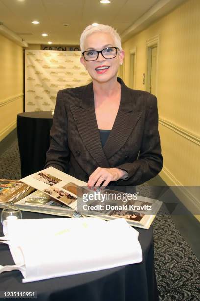 Miss America 1982 Elizabeth Ward Gracen, Producer and Editor looks at some old photographs before the screening of Miss America Foundation & Flapper...