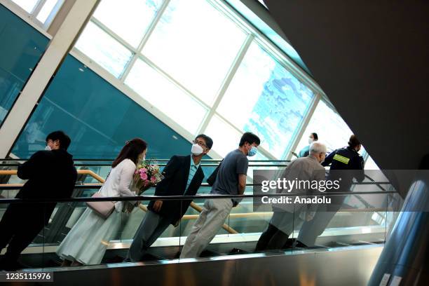 People waiting for arriving passengers are seen at Vancouver International Airport YVR upon their arrival on September 7, 2021 in Vancouver, British...