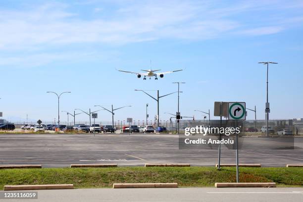 Plane is on approach to land at the Vancouver International Airport YVR on September 7, 2021 in Vancouver, British Columbia, Canada. Foreign visitors...