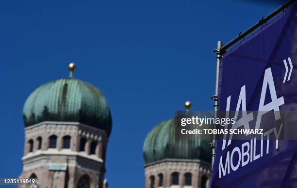 Banner with the logo "IAA Mobility" is pictured next to the towers of landmark Frauenkirche during the International Motor Show Germany, on September...