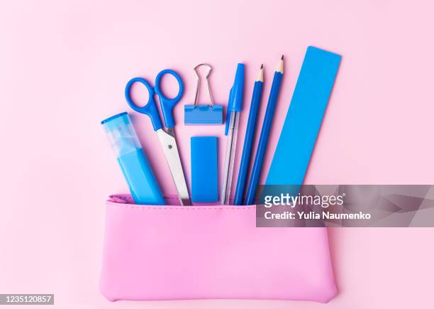 back to school concept, pencil case, stationery and school supplies. top view, copy space, pink background. - etui stockfoto's en -beelden