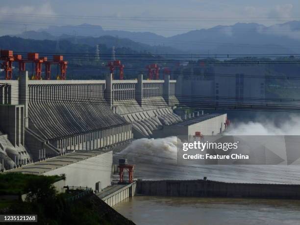 Water gushes out of flood discharge gates on the Three Gorges Dam in Yichang in central China&#039;s Hubei province Wednesday, Sept. 08, 2021.