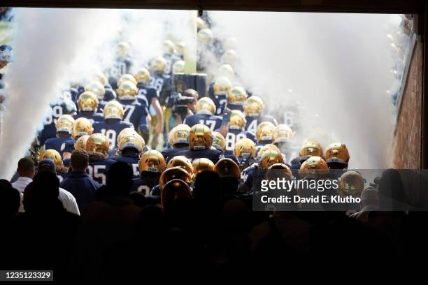 Rear view of Notre Dame players going through tunnel on way to take field before game vs Pittsburgh at Notre Dame Stadium. South Bend, IN CREDIT:...
