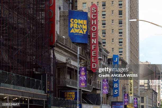 The marquee of the Broadway musical 'Come From Away' together with other broadway marquees are seen prior to their re-opening after the Covid-19...