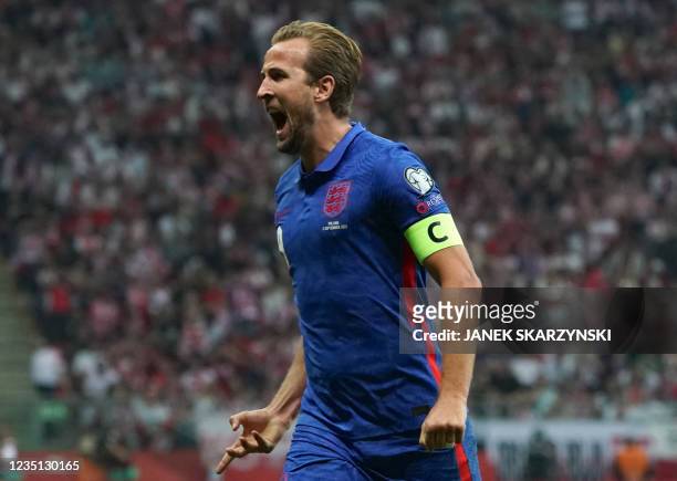 England's forward Harry Kane celebrates after scoring the 0-1 goal during the FIFA World Cup Qatar 2022 qualification Group I football match between...