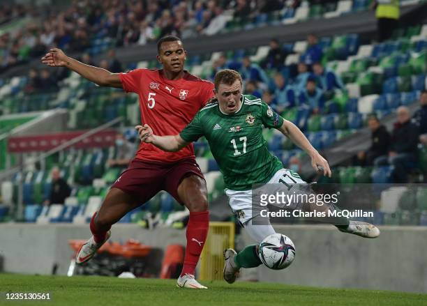 Shayne Lavery of Northern Ireland and Manuel Akanji of Switzerland during the 2022 FIFA World Cup Qualifier match between Northern Ireland and...