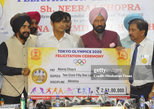 Tokyo 2020 Olympics Gold medalist Neeraj Chopra being felicitated in the presence of Punjab Sports and Youth Services Minister Rana Gurmit Singh...