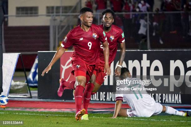 Rolando Blackburn of Panama celebrates after scoring the first goal of his team with teammate Michael Mulirro during the match between Panama and...
