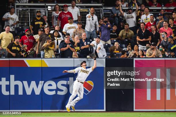 Wil Myers of the San Diego Padres makes a catch in left field in the sixth inning against the Los Angeles Angels at Petco Park on September 8, 2021...