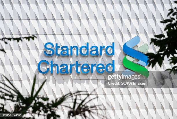 British multinational banking and financial services company, Standard Chartered log and branch in Hong Kong.