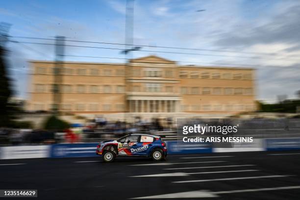 S Sean Johnston with his co-driver Aleander Kihurani compete with their citroen C3 RC2 WRC2 in front of the Greek Parliament during the opening stage...